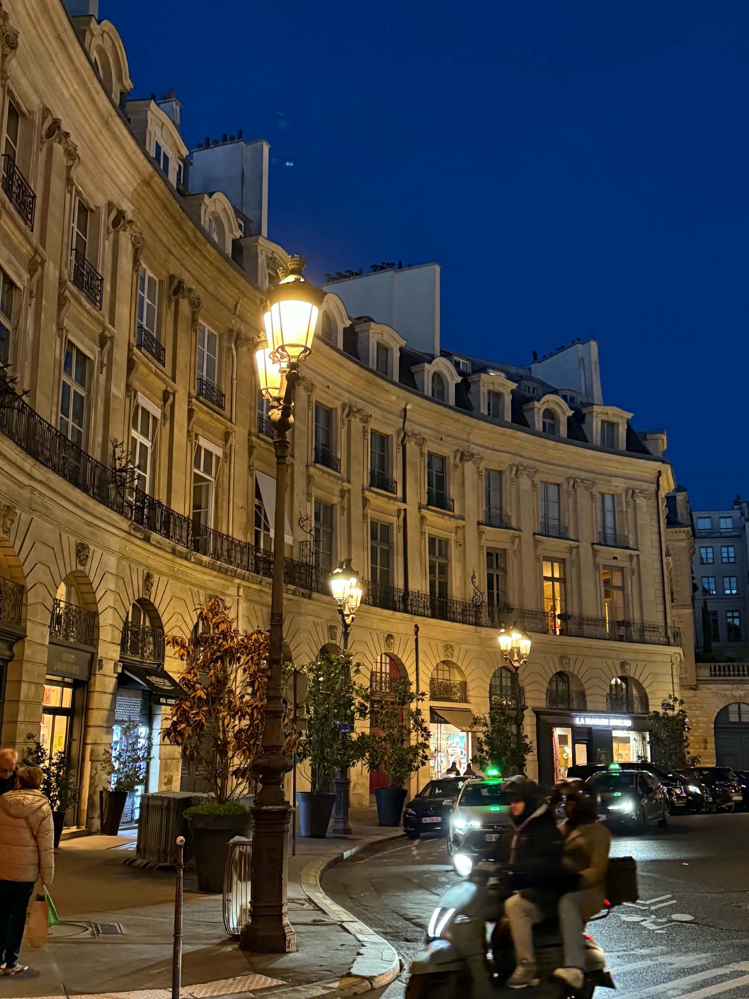 A softly illuminated Paris street at night