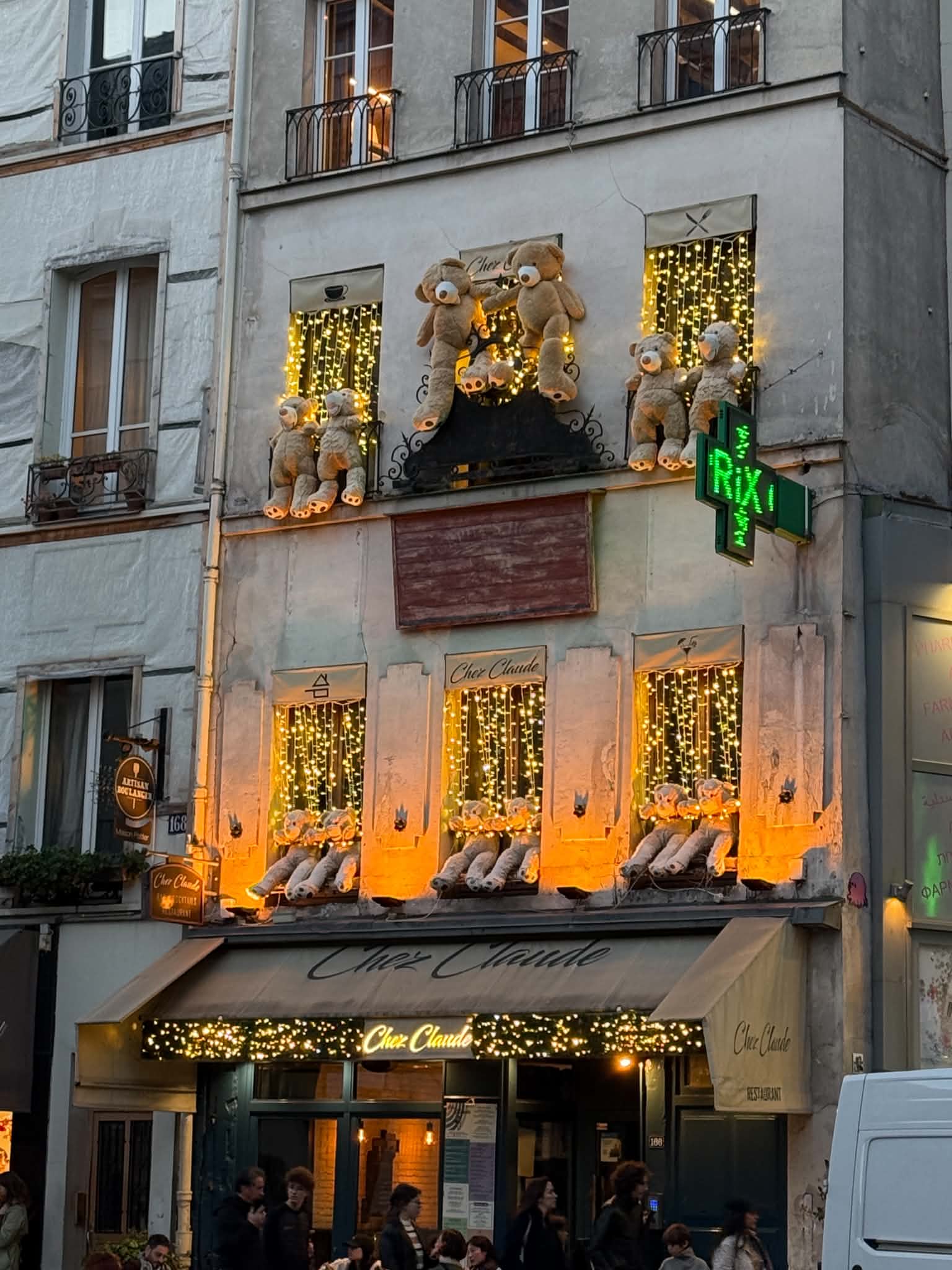 A whimsical teddy-bear adorned façade in Paris