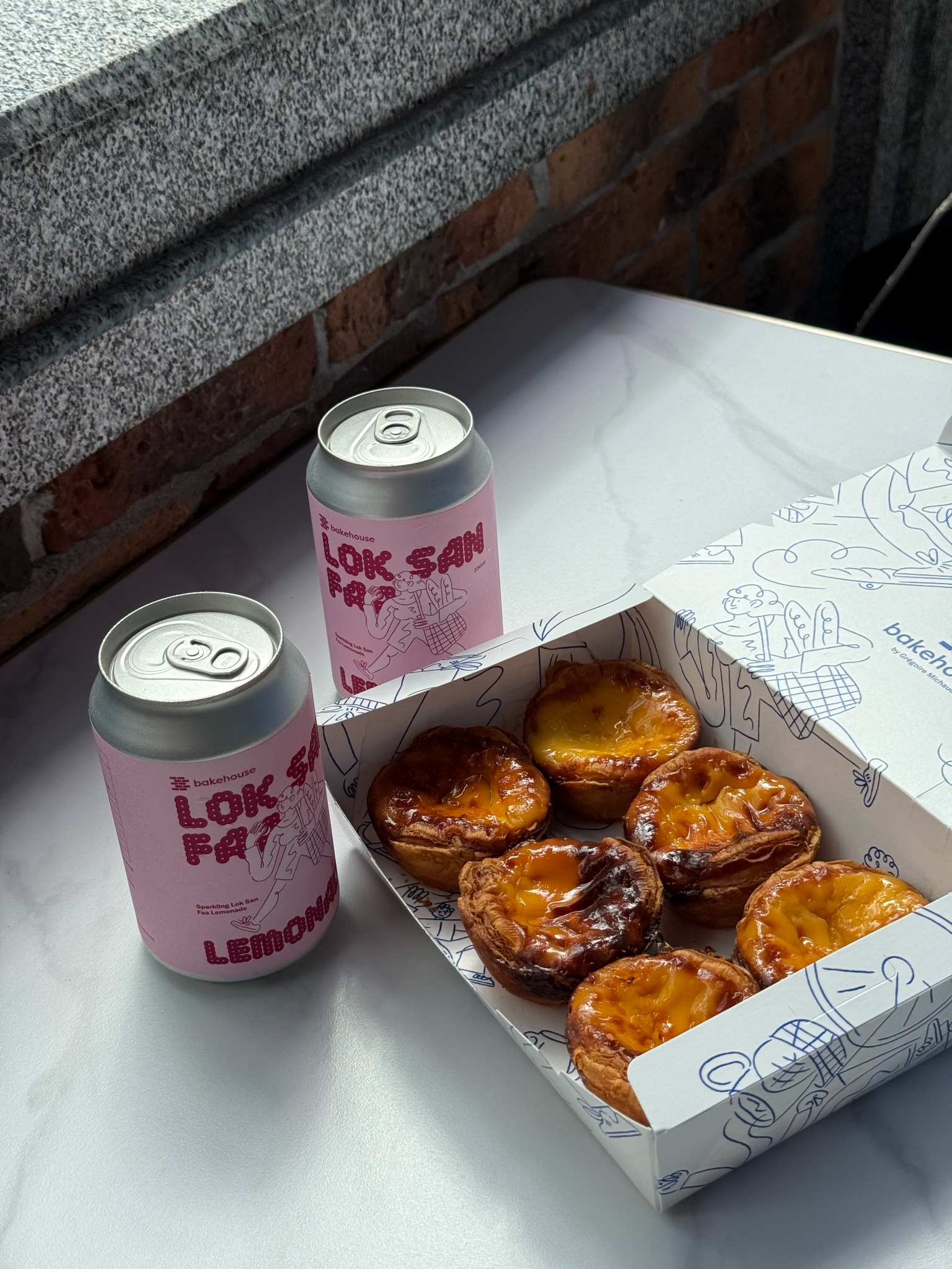 Freshly baked egg tarts enjoyed during the Hong Kong journey